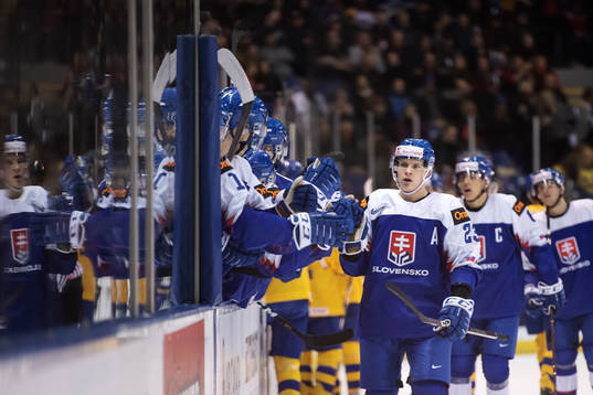 Adam Liska of Slovakia celebrates with teammates