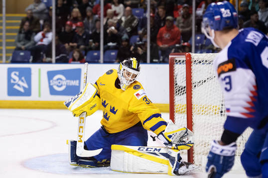 Goaltender Samuel Ersson of Sweden makes a save