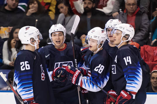 Joel Farebee (C) of USA celebrates with teammates