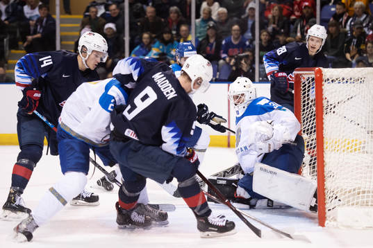 Josh Norris, Tyler Madden and Joel Farebee of USA attacking