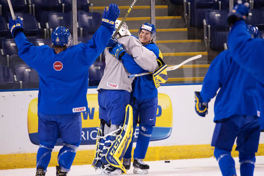 Goaltender Olle Eriksson Ek and Isac Lundeström  of team