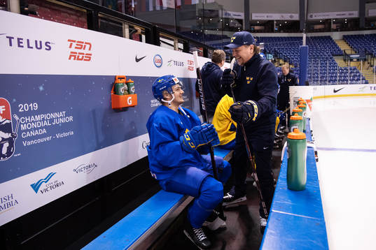 Erik Brännström and goalie coach Nizze Landén of team