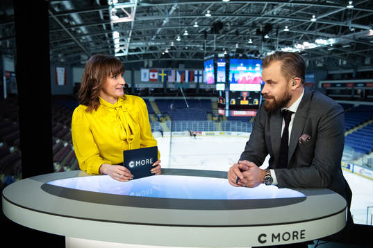 TV commentators Lena Sundqvist and Sanny Lindström in the