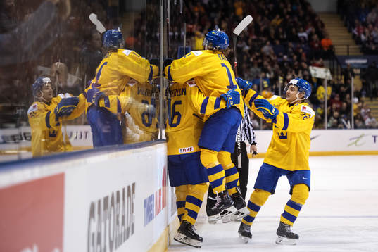 Filip Westerlund of Sweden celebrates with teammates