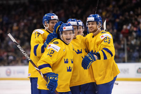 Erik Brännström of Sweden celebrates with teammates