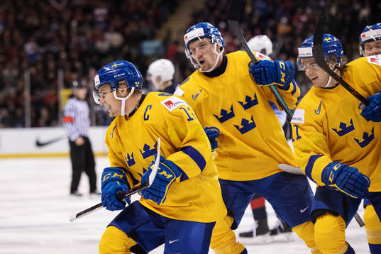 Erik Brännström of Sweden celebrates with teammates