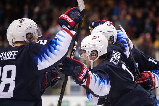 Ryan Poehling of USA celebrates with teammates