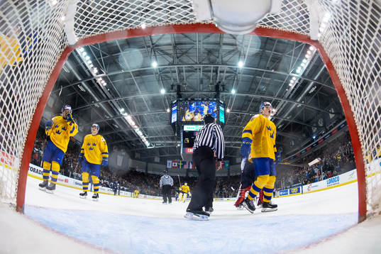 Filip Westerlund (R) of Sweden celebrates the game winning