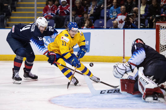 Mattias Samuelsson of USA is being challenged by Samuel