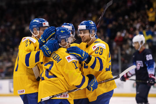 Erik Brännström of Sweden celebrates with teammates