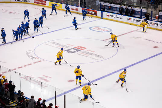 Players of Kazakhstan and Sweden warm up