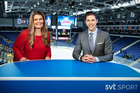 TV commentators Marie Lehmann and Jonas Andersson in the
