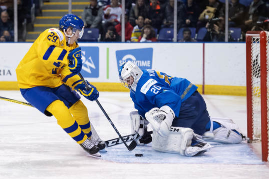 Pontus Holmberg of Sweden in action against goaltender
