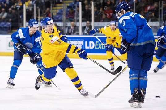 Adam Boqvist of Sweden shoots the puck