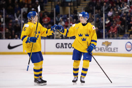 Filip Westerlund and Nils Lundkvist of Sweden celebrate the