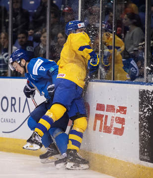 Sayan Daniyar of Kazakhstan in action against Rasmus Sandin