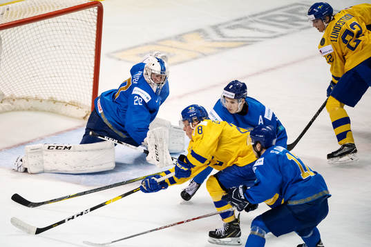 Goaltender Denis Karatayev, Valeri Orekhov and Sayan