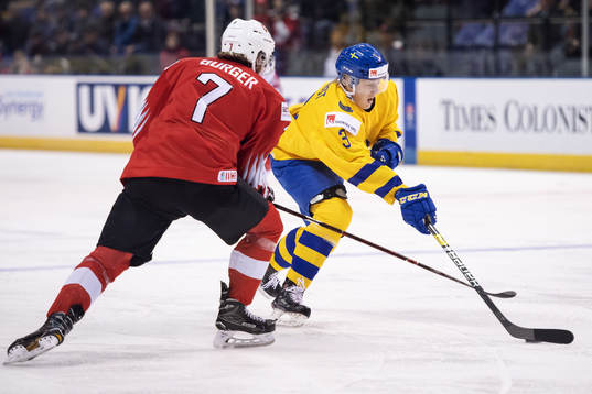 Gianluca Burger of Switzerland and Adam Boqvist of Sweden