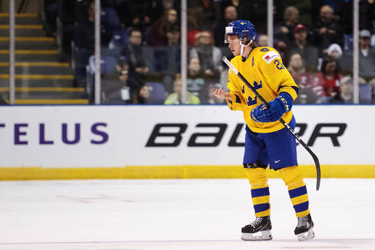 Rickard Hugg of Sweden bleeds