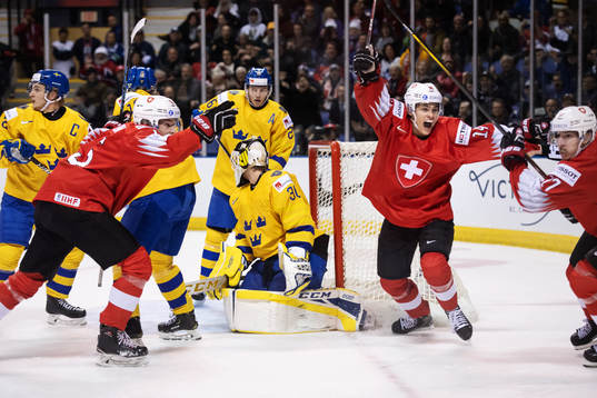 Matthew Verboon, Sandro Schmid and Luca Wyss of Switzerland
