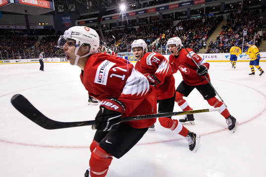 Luca Wyss, Sandro Schmid and Matthew Verboon of Switzerland