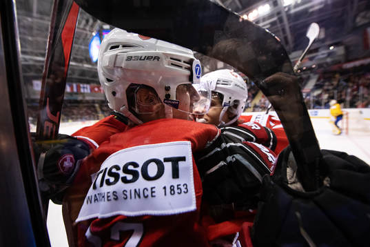 Luca Wyss of Switzerland celebrates with teammates