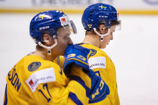 Filip Sveningsson and Adam Boqvist of Sweden look dejected