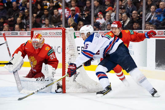 Goaltender Pyotr Kochetkov and Danil Zhuravlyov of Russia
