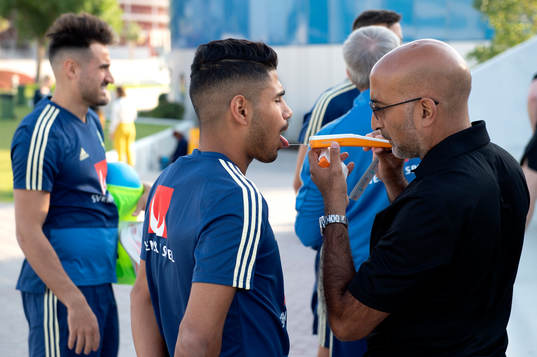 Sweden's Hosam Aiesh gives a saliva test prior to a