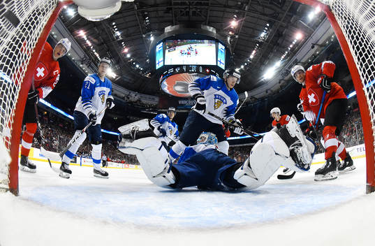 Switzerland's Philipp Kurashev #23 scores a first period