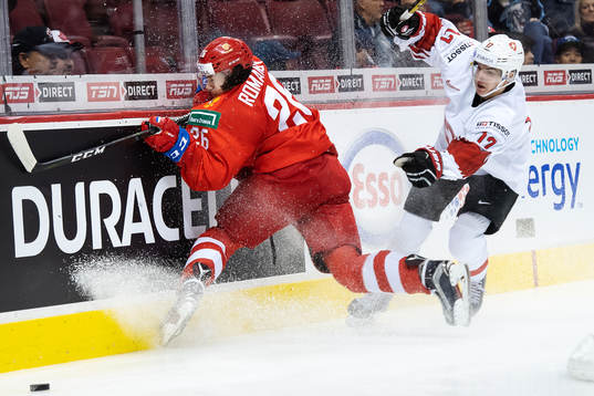Alexander Romanov of Russia in action against Luca Wyss of
