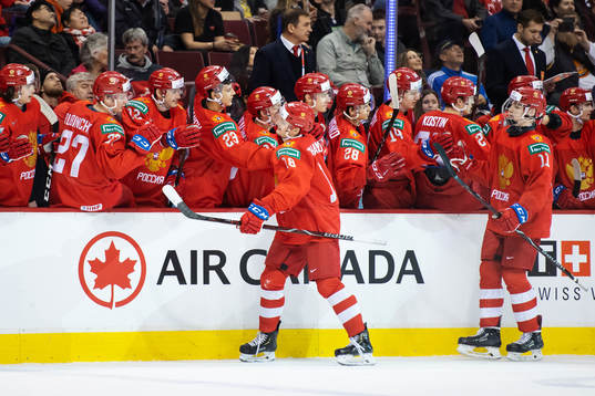 Nikita Shashkov and Vasili Podkolzin of Russia celebrate