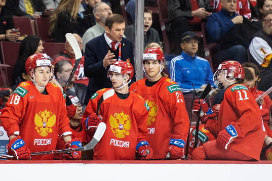 Head coach Valeri Bragin of Russia talks to his players