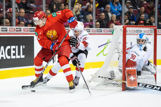 Ivan Morozov of Russia in action against Davyd Barandun and