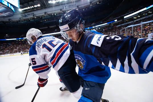 Jason Robertson of USA and Toni Utunen of Finland