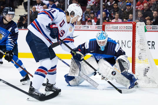 Ryan Poehling of USA shoots at goaltender Ukko-Pekka