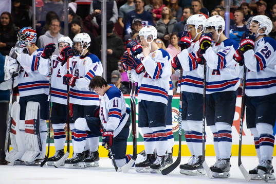 Players of USA look dejected