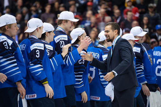 Head coach Jussi Ahokas of Finland celebrates together with