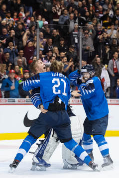 Otto Latvala, goaltender Ukko-Pekka Luukkonen and Toni