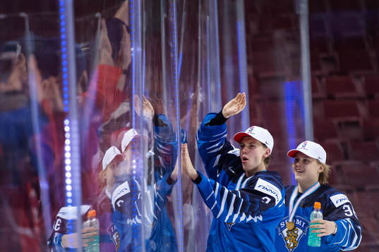 Oskari Laaksonen and Anttoni Honka of Finland celebrate
