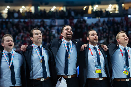 Head coach Jussi Ahokas (C) of Finland together with his