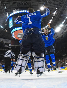 Goaltender Ukko-Pekka Luukkonen and Otto Latvala celebrate