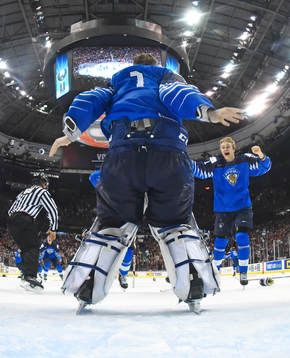 Goaltender Ukko-Pekka Luukkonen and Otto Latvala celebrate