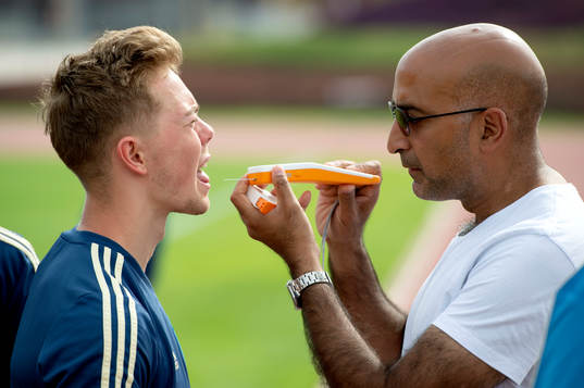 Sweden's Joel Andersson takes a saliva test