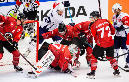 Goalkeeper Johan Gustafsson of Frölunda defends