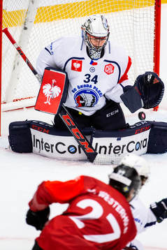 Goalkeeper Dominik Frodl of HC Plzens saves a shot from