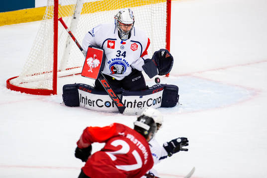 Goalkeeper Dominik Frodl of HC Plzens saves a shot from