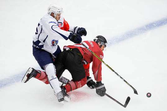 Petr Straka of HC Plzen hits Sebastian Stålberg of