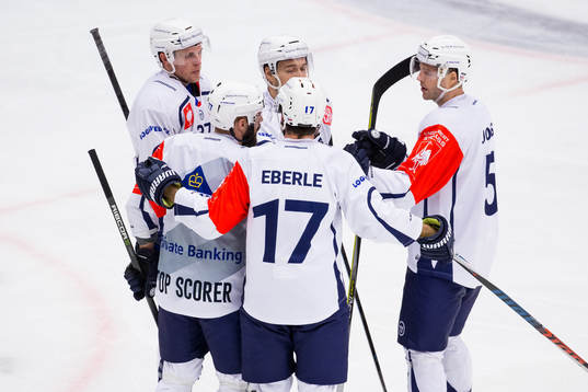Conor Allen of HC Plzen celebrates scoring his teams third