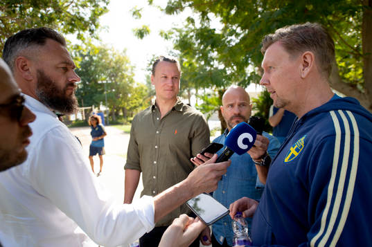 Swedish journalists interview Sweden's assistant coach